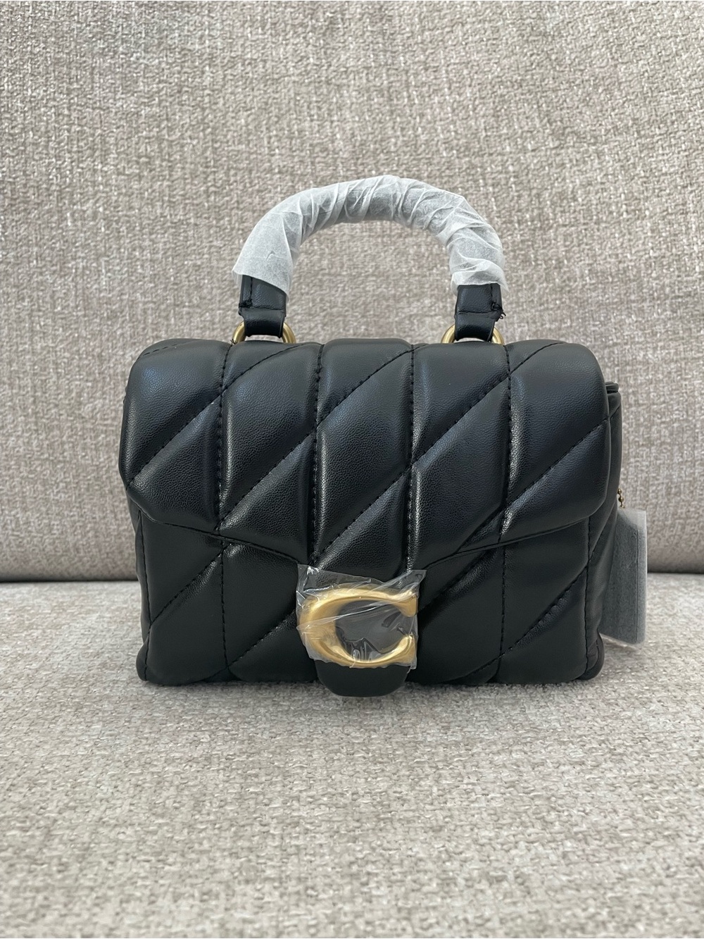 COACH Tabby Top Handle Bag
With Quilting